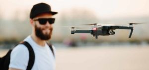 operator flying drone